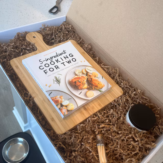 Real customer photo of a personalized engraved cutting board